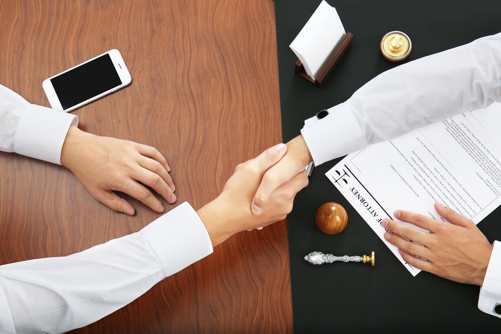 male hands pen signing document desk