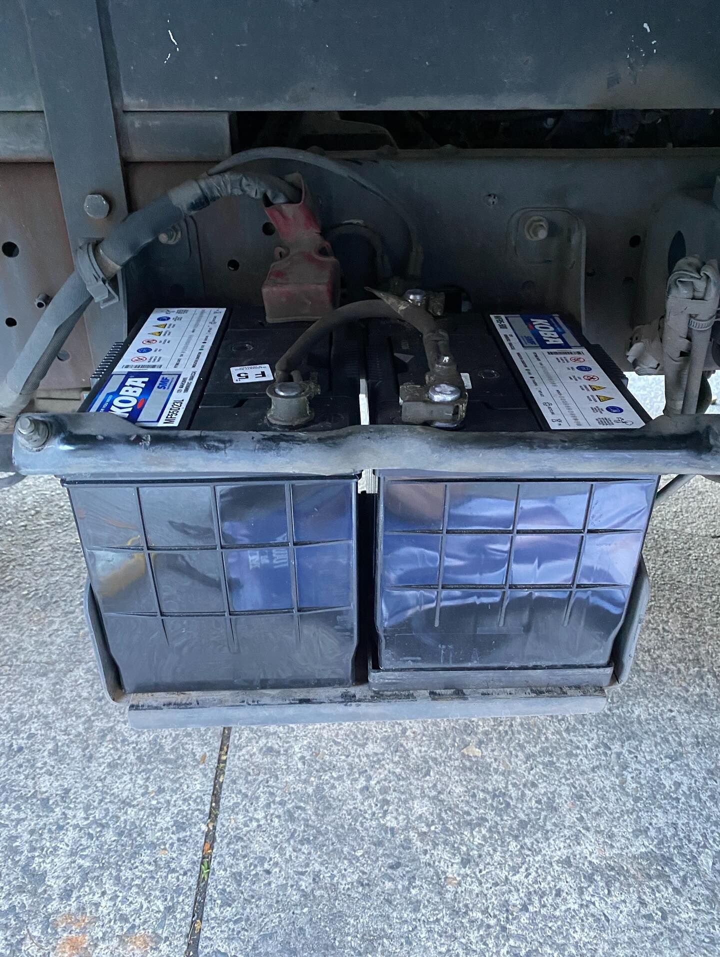 Two Black Batteries in a Protective Enclosure — ASAP Batteries & Breakdowns in Helensvale, QLD