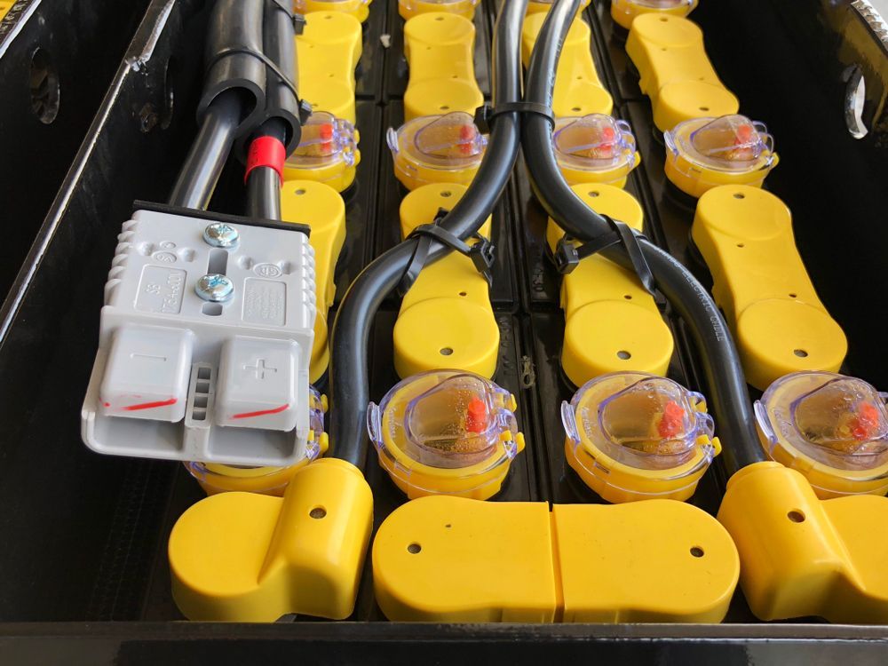 Close-up of a Black Battery Case With Yellow Battery Terminals — ASAP Batteries & Breakdowns in Helensvale, QLD