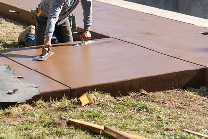 male worker stained the concrete