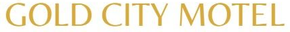 Gold City Motel sign in gold lettering on a white background