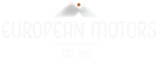A white logo for european motors with a mountain in the background.