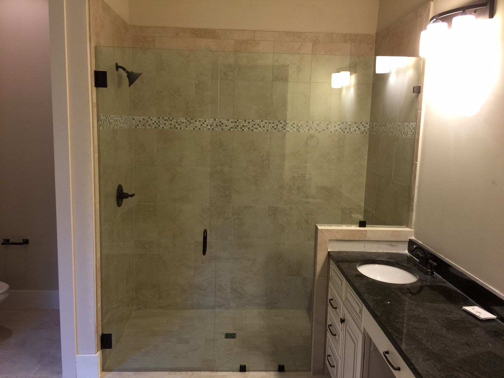 Frameless shower door 170