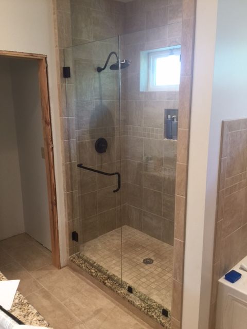 Frameless shower door 36