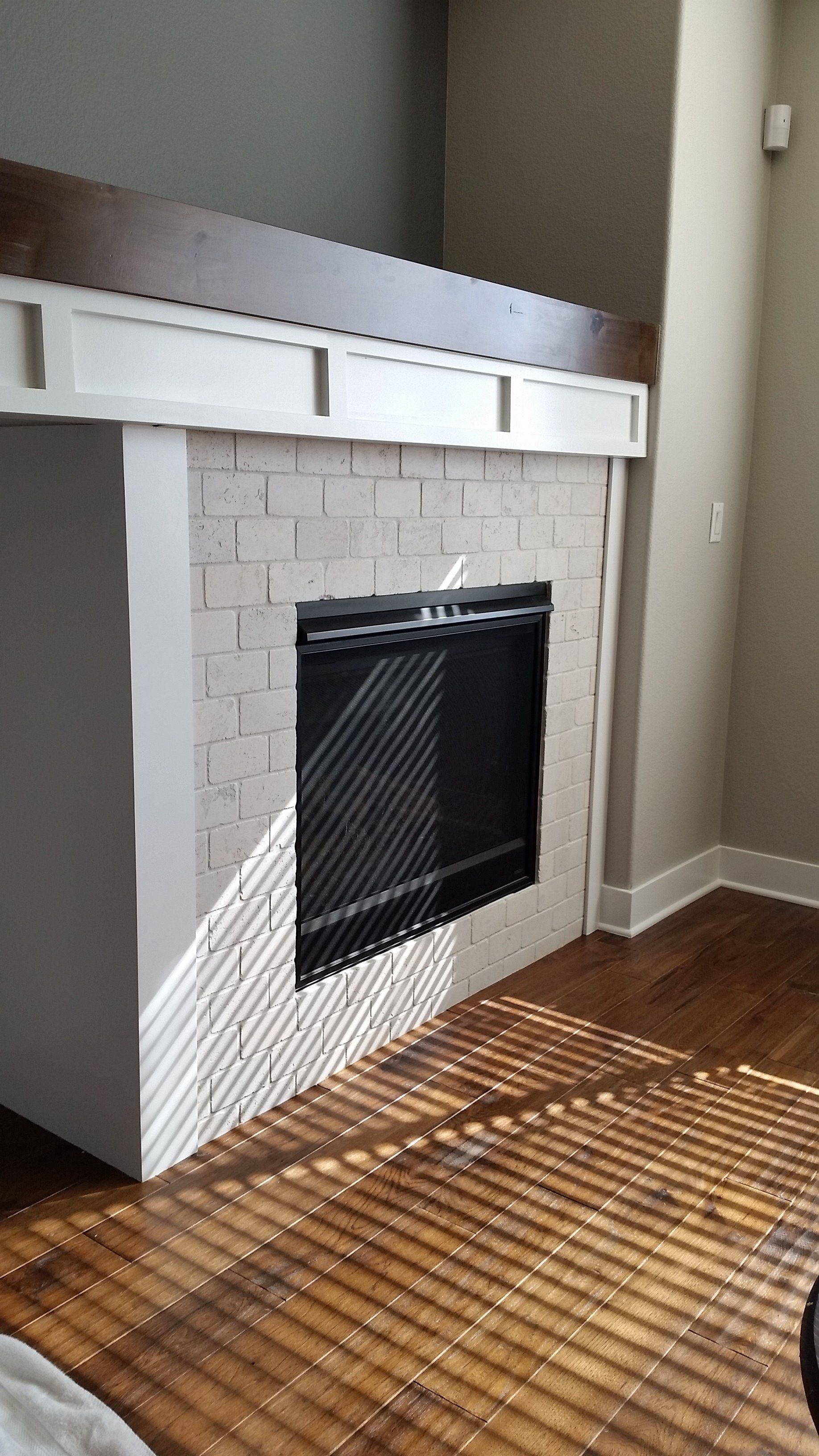 painted brick fireplace