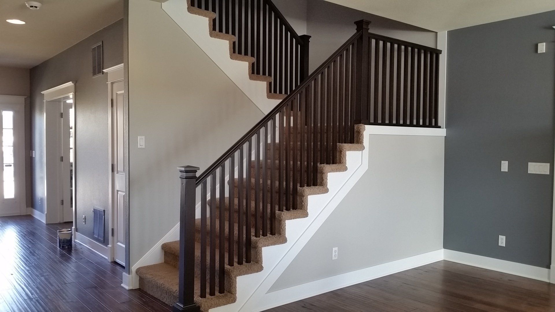 brown stair rail painted