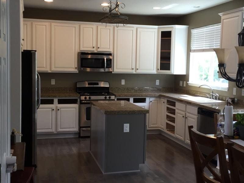 white painted kitchen gray island