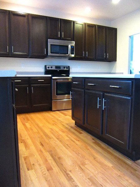 Newly painted black kitchen cabinets