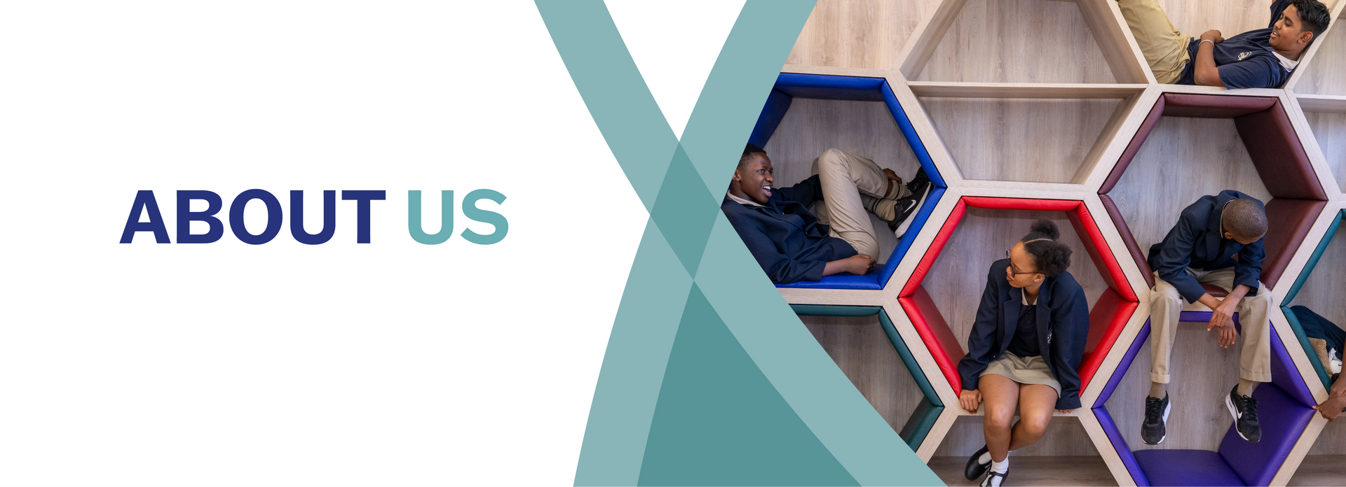 People sitting in colorful hexagonal cubbies; 