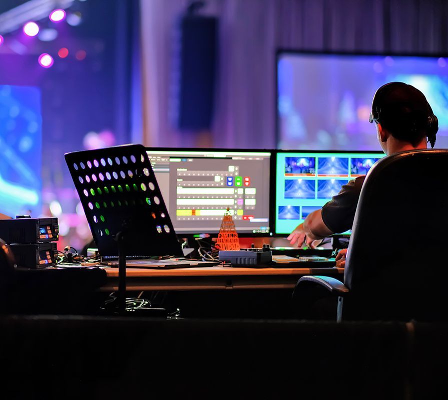 Person Controlling Lights And Sound