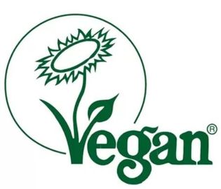 Il logo della Vegan Society presenta un'icona di un girasole verde scuro sopra la parola 