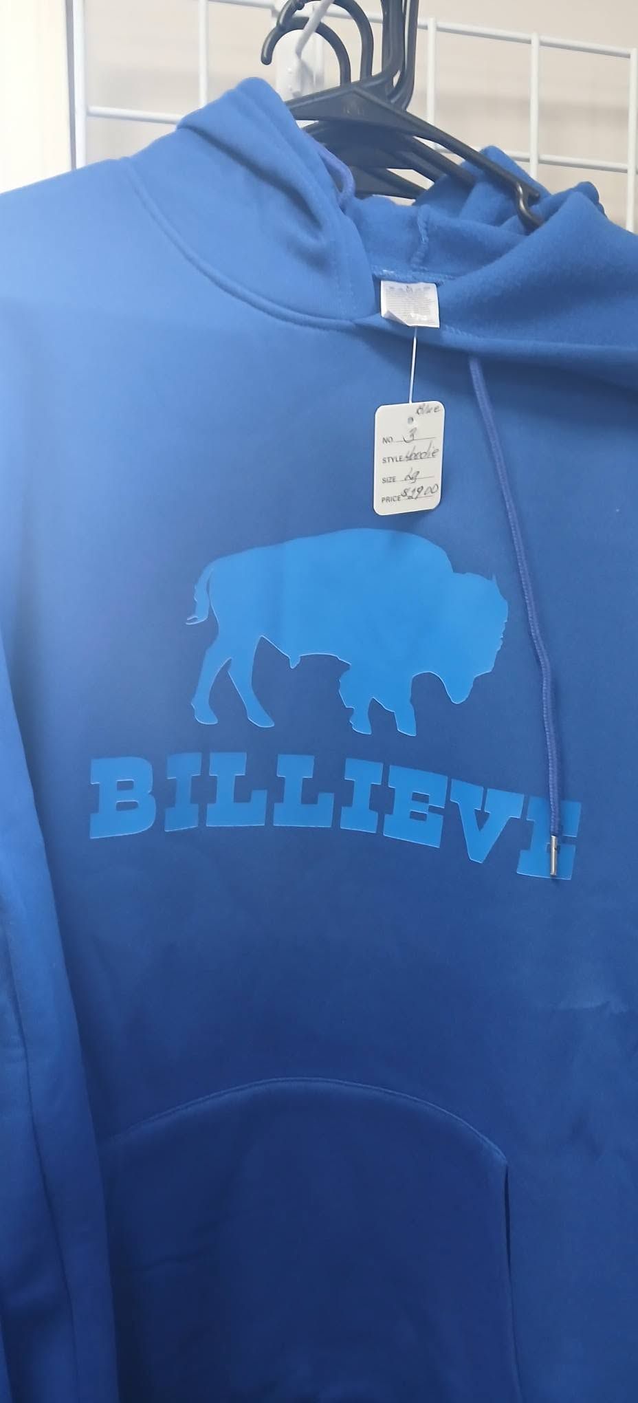 Blue hoodie with a buffalo graphic and the word “BELIEVE” printed on the front.