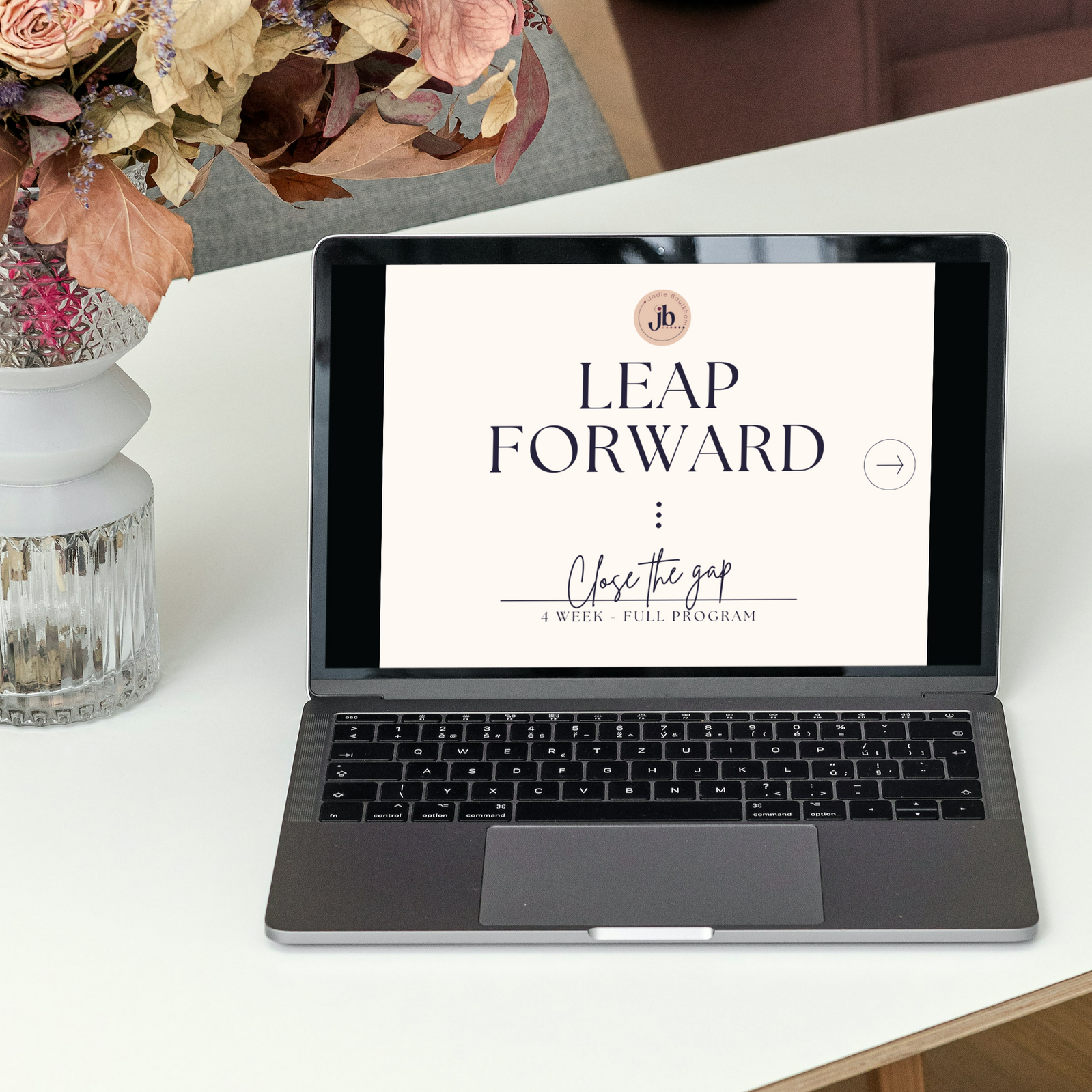 a laptop is open to a page that says leap forward