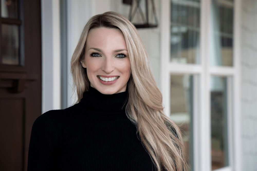 Headshot photo of interior designer Laura Brown used in a blog post featuring Vanguard at Vermillion
