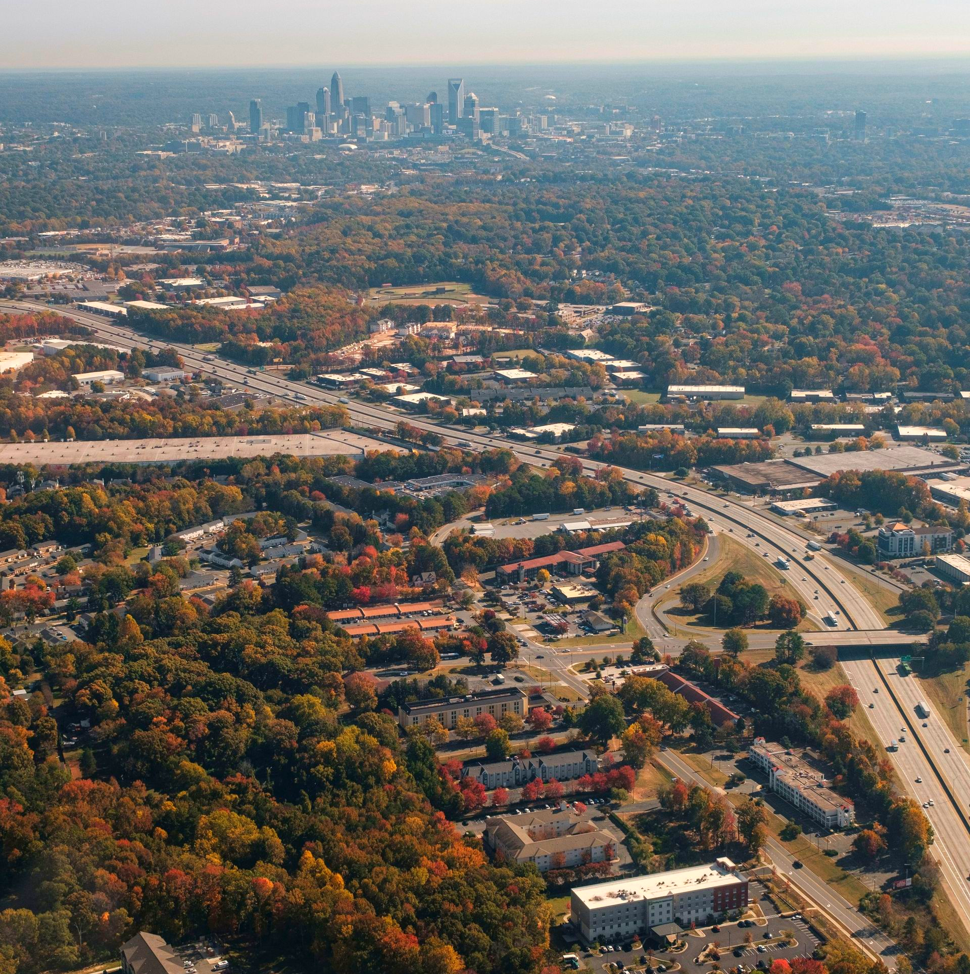 Roads and buildings leading up to, at the top of the image, Charlotte, NC.