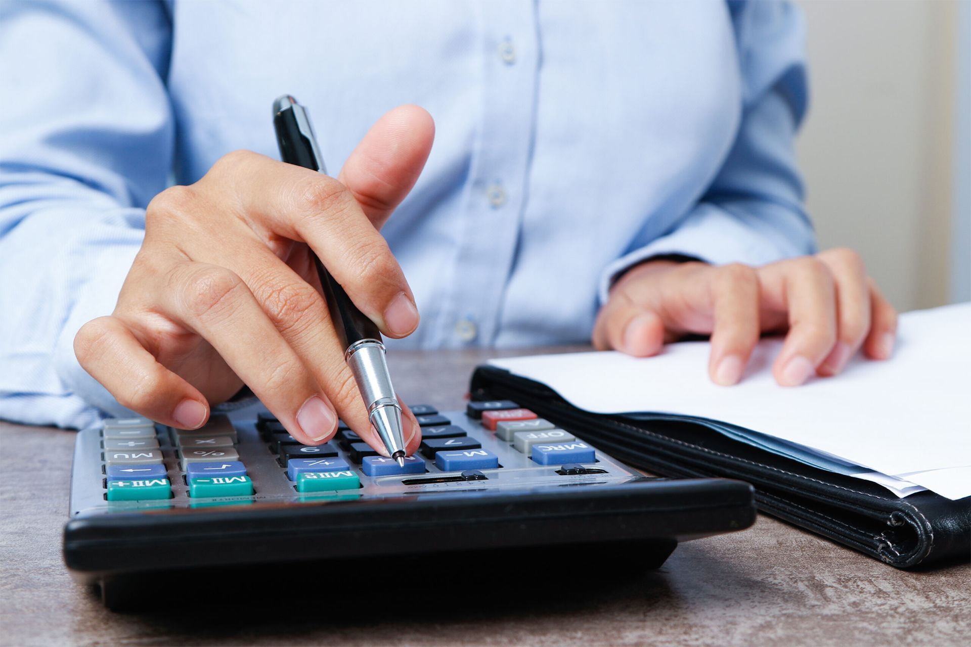 Accountant Using a Calculator Accountant Using a Calculator