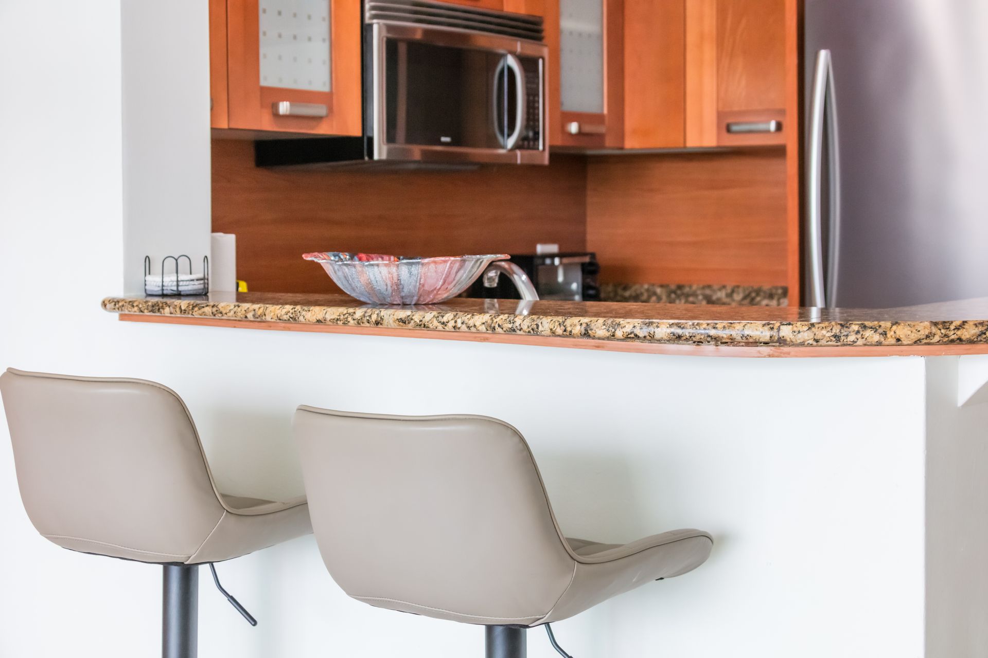 Kitchen and breakfast bar inside a Condado vacation rental studio in San Juan, Puerto Rico