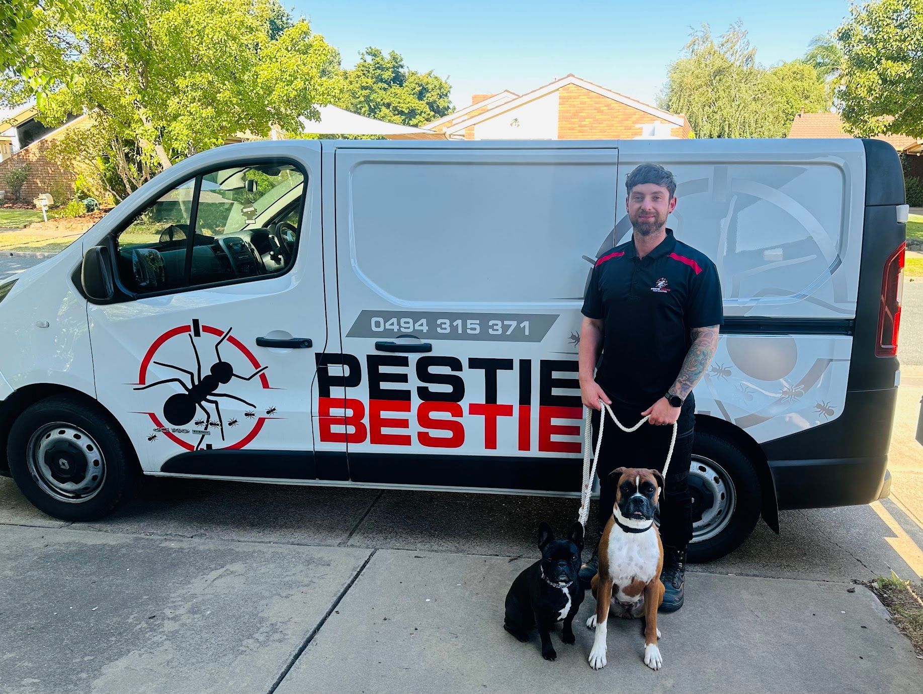 A Technician and Helper Standing In Front of a White Van — Pestie Bestie Pest Control In Shepparton, VIC