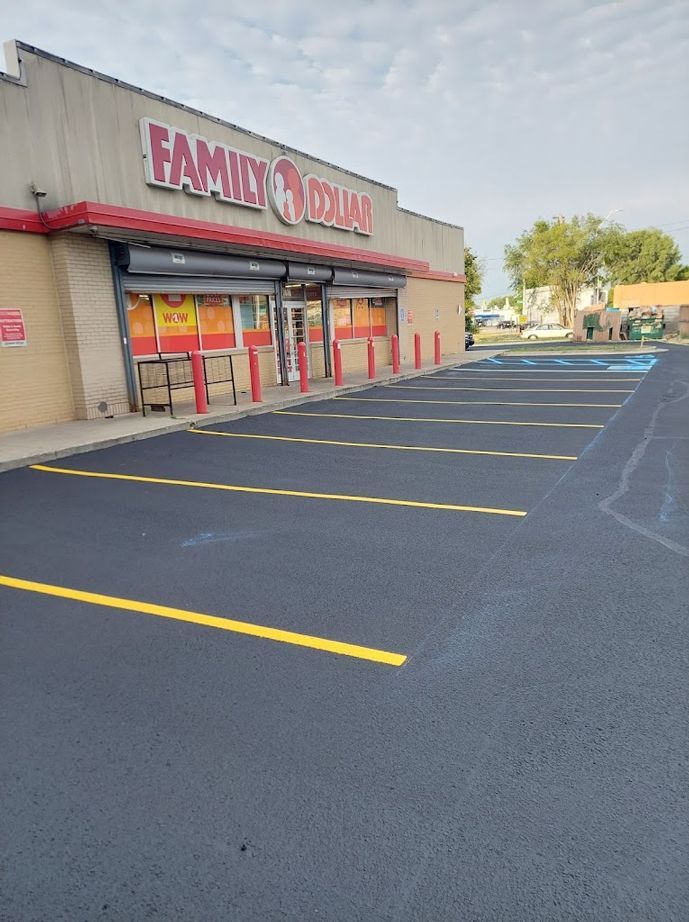 Family Dollar store with newly painted parking lot and accessible parking space.