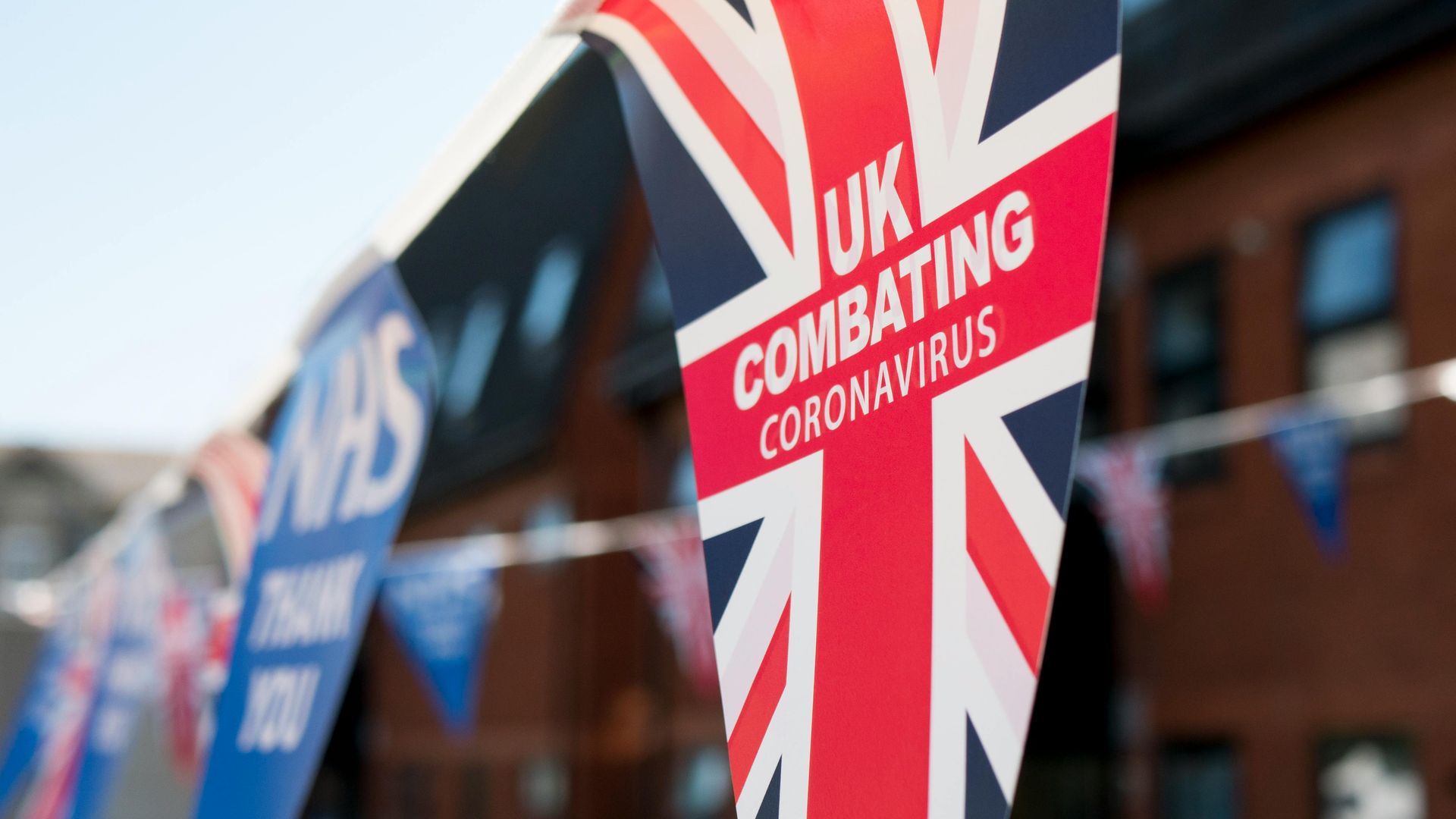 Union Jack flag bunting with text