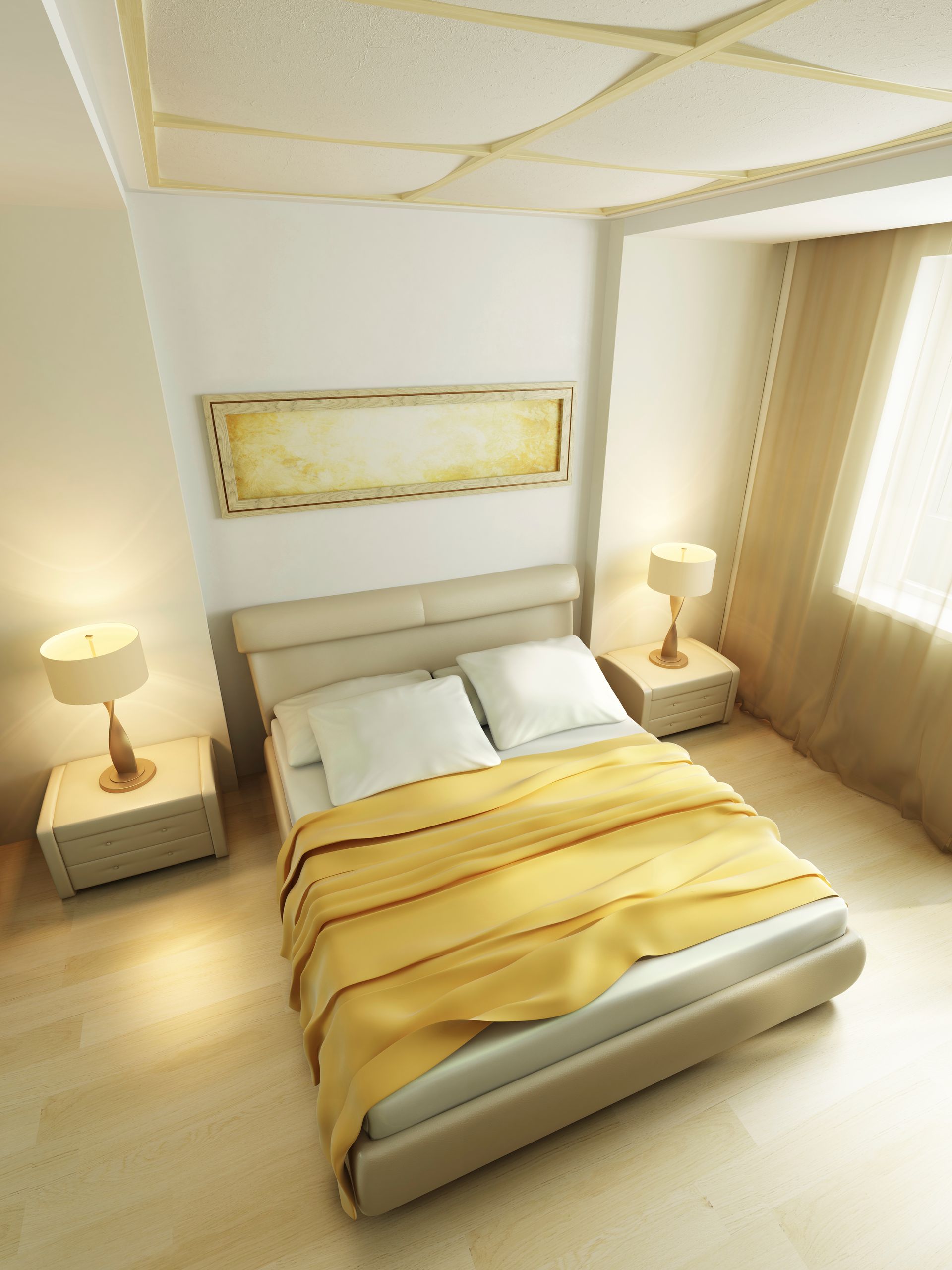 A bedroom with a large bed and two nightstands.