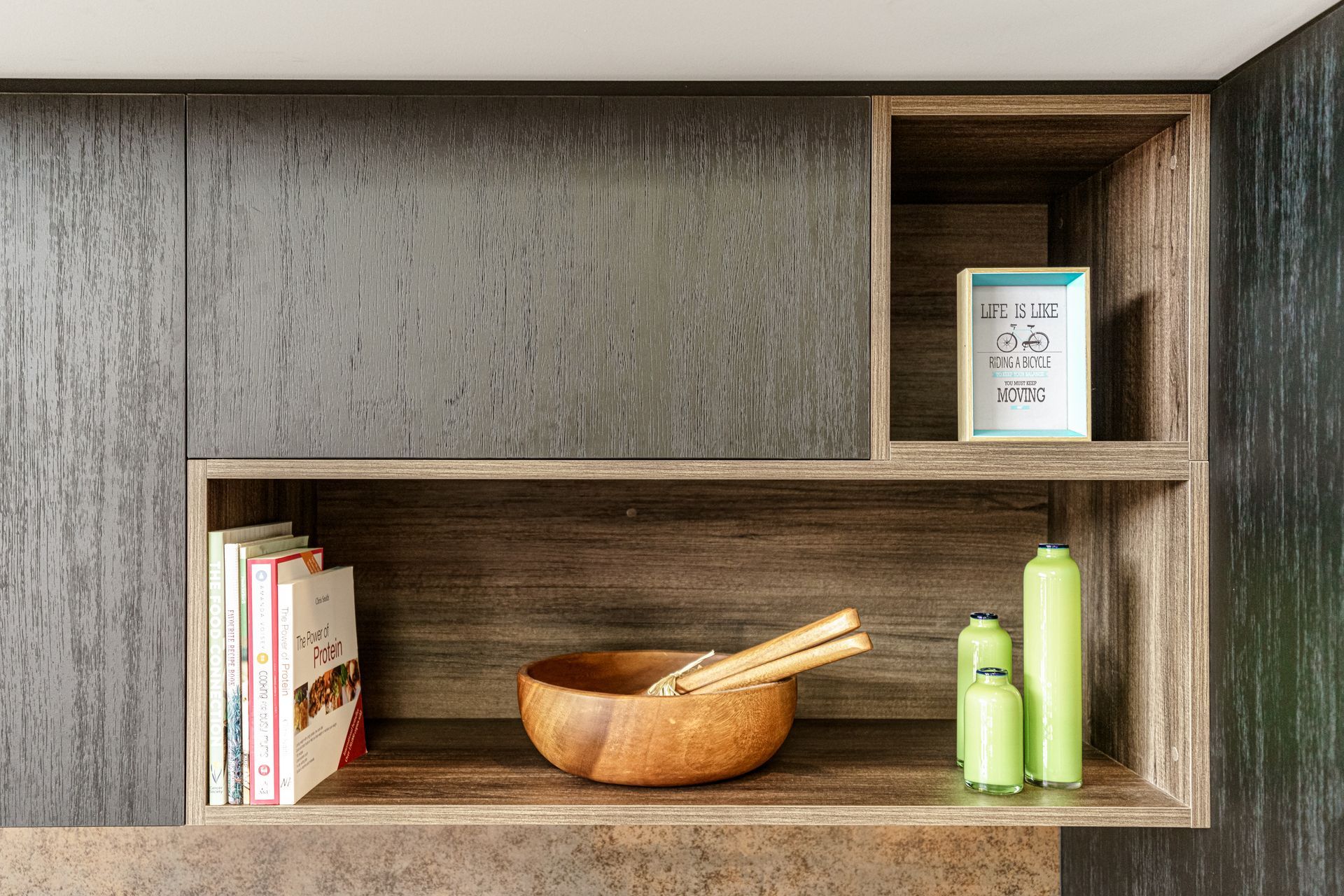 A wooden shelf with a bowl and chopsticks on it.