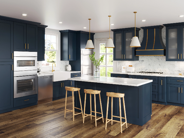Modern navy-blue kitchen with white countertops, island seating, and warm wood floors