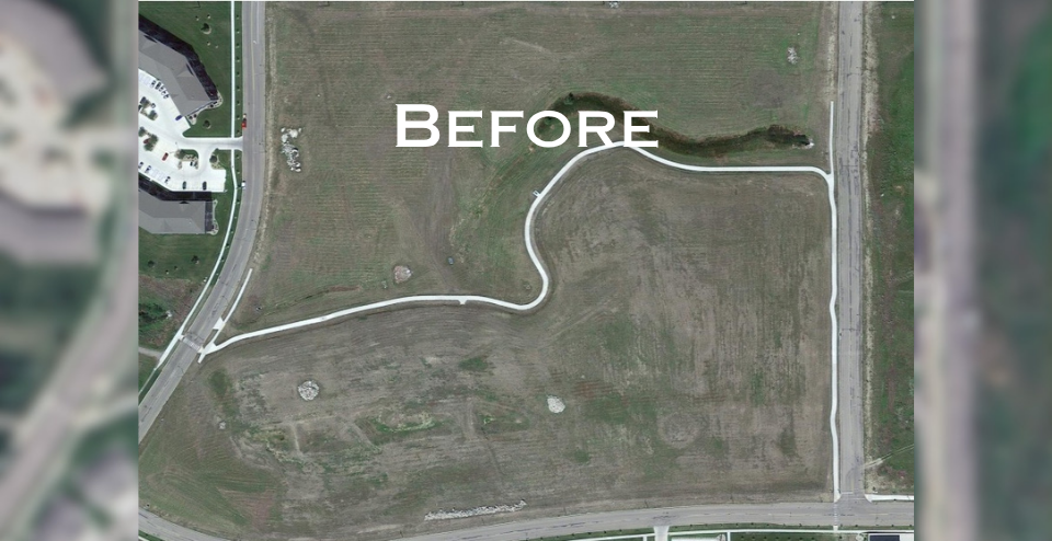 An aerial view of a multi-unit suburban housing rental development, before construction.