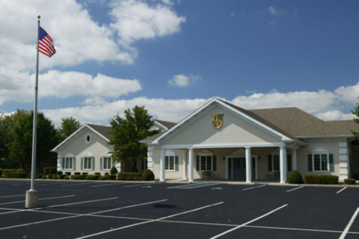 Several photos of interior and exterior facilities of Flanner Buchanan Speedway Location in Indianapolis, IN