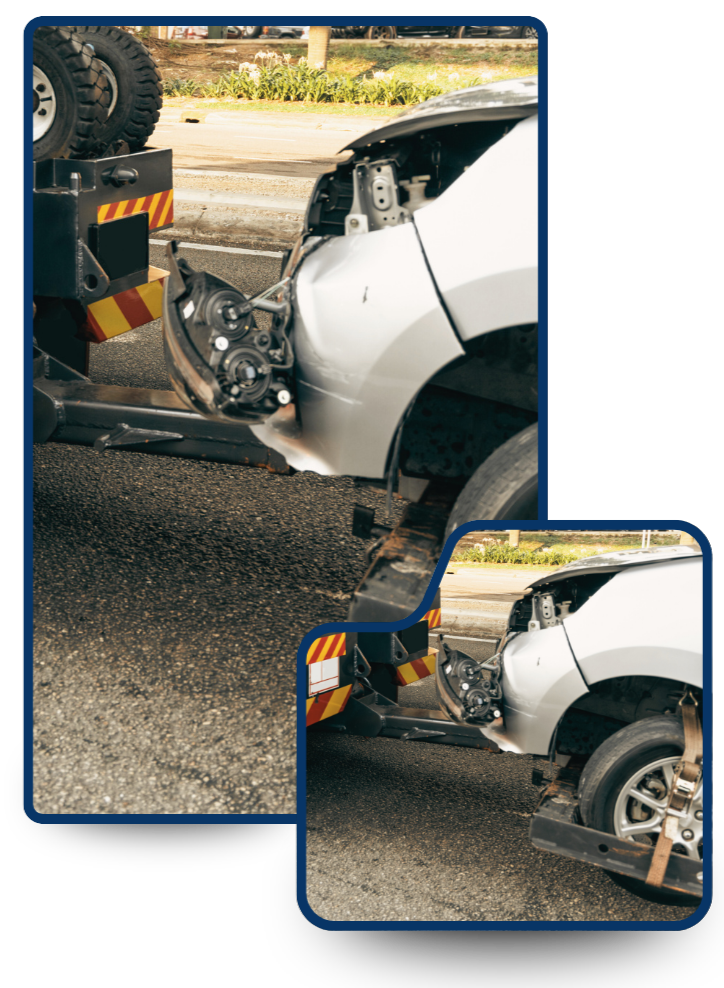 Wrecker operator positioning vehicle for towing
