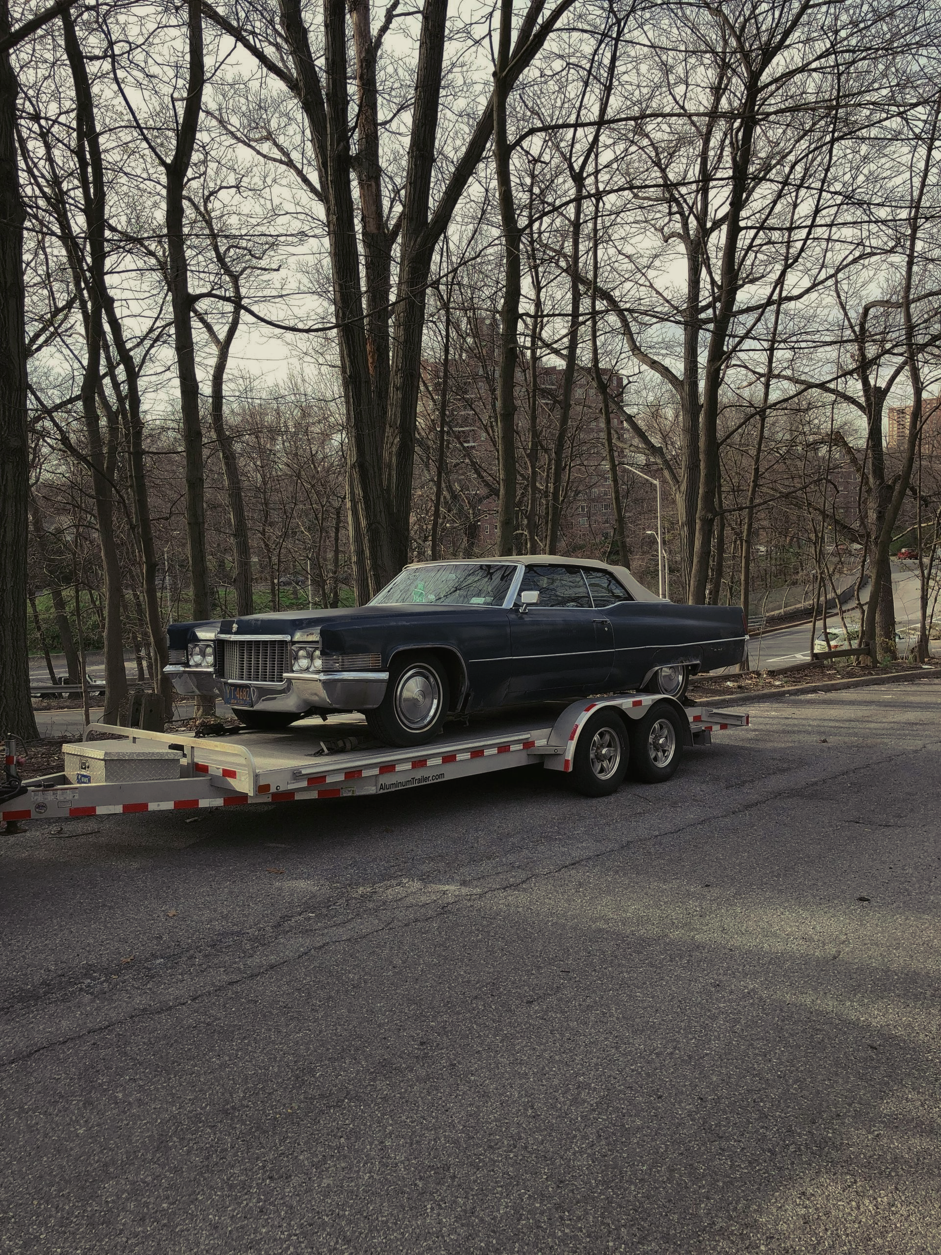 Tow truck lights flashing during nighttime service call