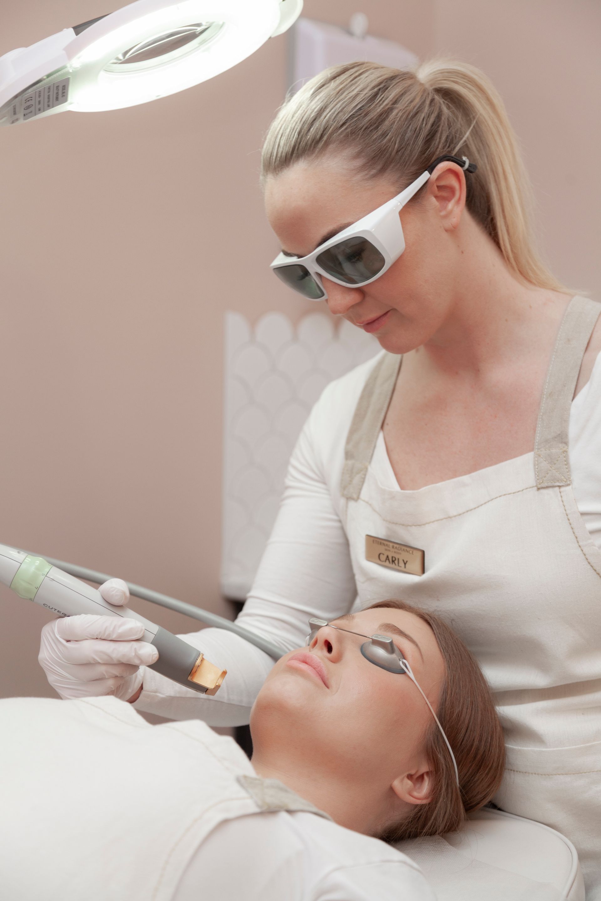 Woman Receiving Facial Laser Treatment, Wearing Protective Glasses — Eternal Radiance in Strathmore, VIC