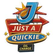 Vintage &ldquo;Just a Quickie&rdquo; oil change sign with a large blue J and red arrow accents.