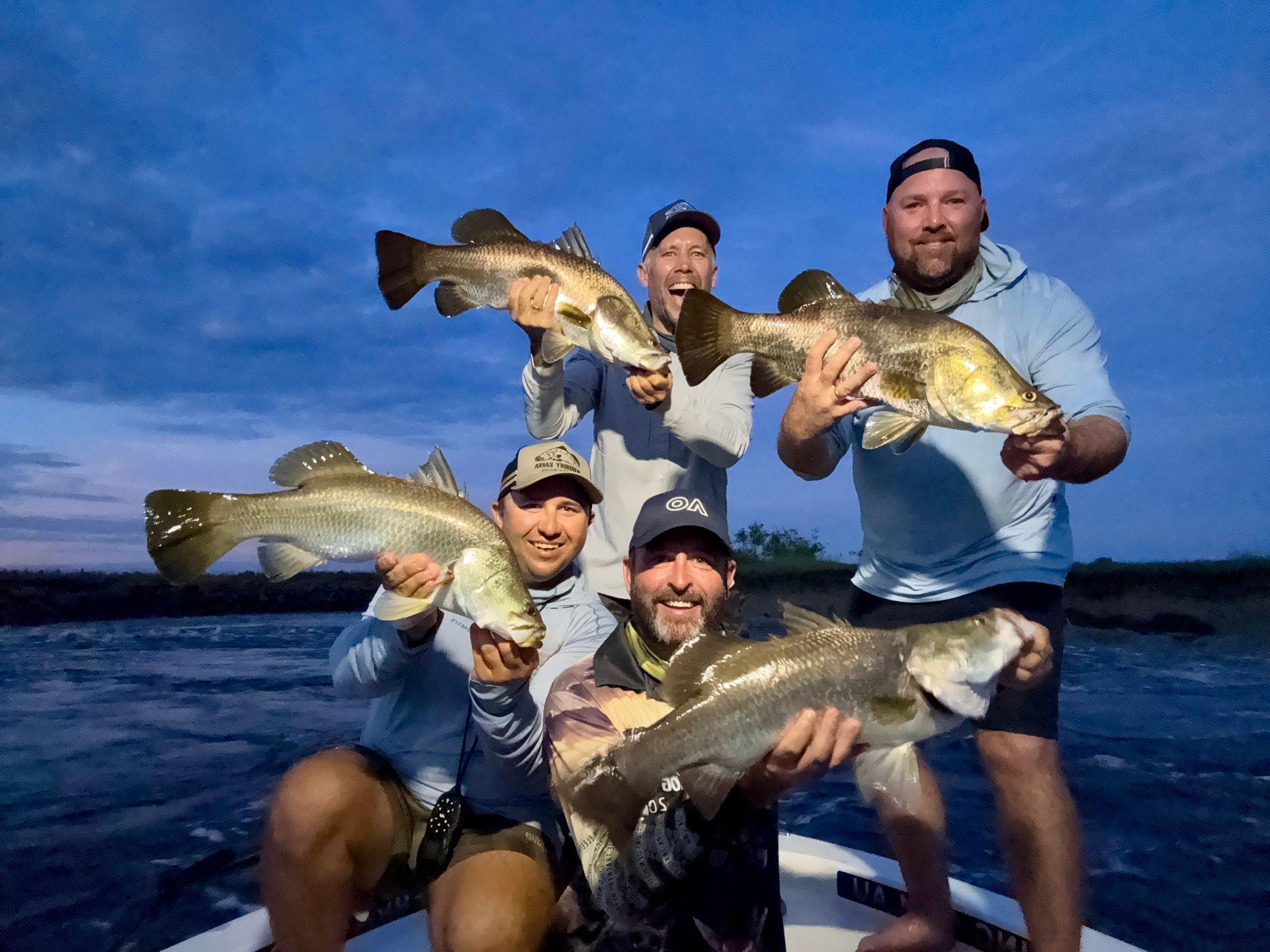 A Wooden Table With A Coffee Maker And A View Of A River — Territory Barra Sportfishing In Zuccoli, NT
