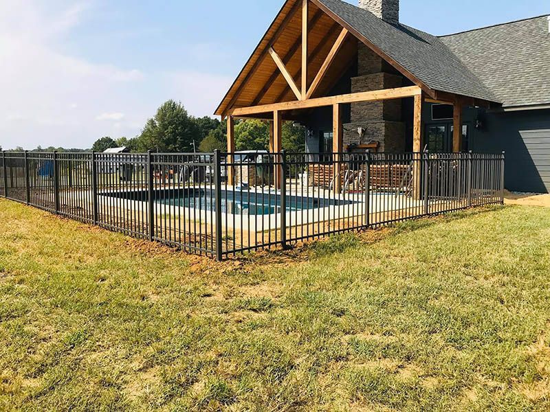 Aluminum installation in Casselton, North Dakota with sleek black pickets, secure pool perimeter, and clean modern lines.