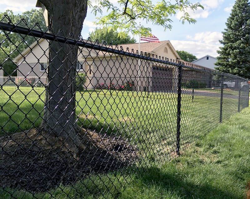Chain Link installed in Horace, North Dakota surrounding a spacious yard with durable mesh panels and black-coated steel posts.
