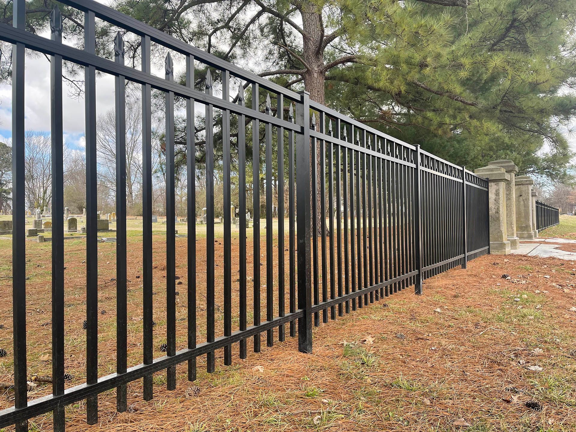 Aluminum installation in Lincolnton, North Carolina featuring tall wood panels for classic style, lasting privacy, and natural curb appeal in residential spaces.