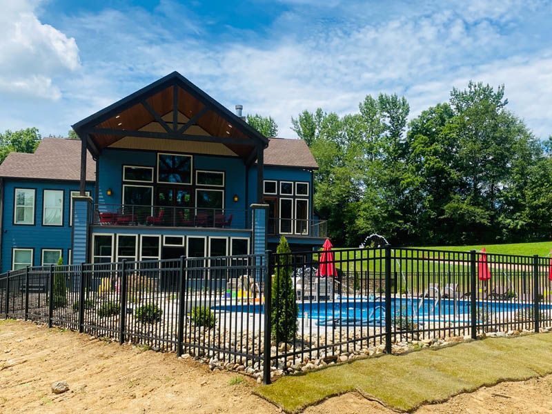 Aluminum installation in Fargo, North Dakota with sleek black pickets, secure pool perimeter, and clean modern lines.
