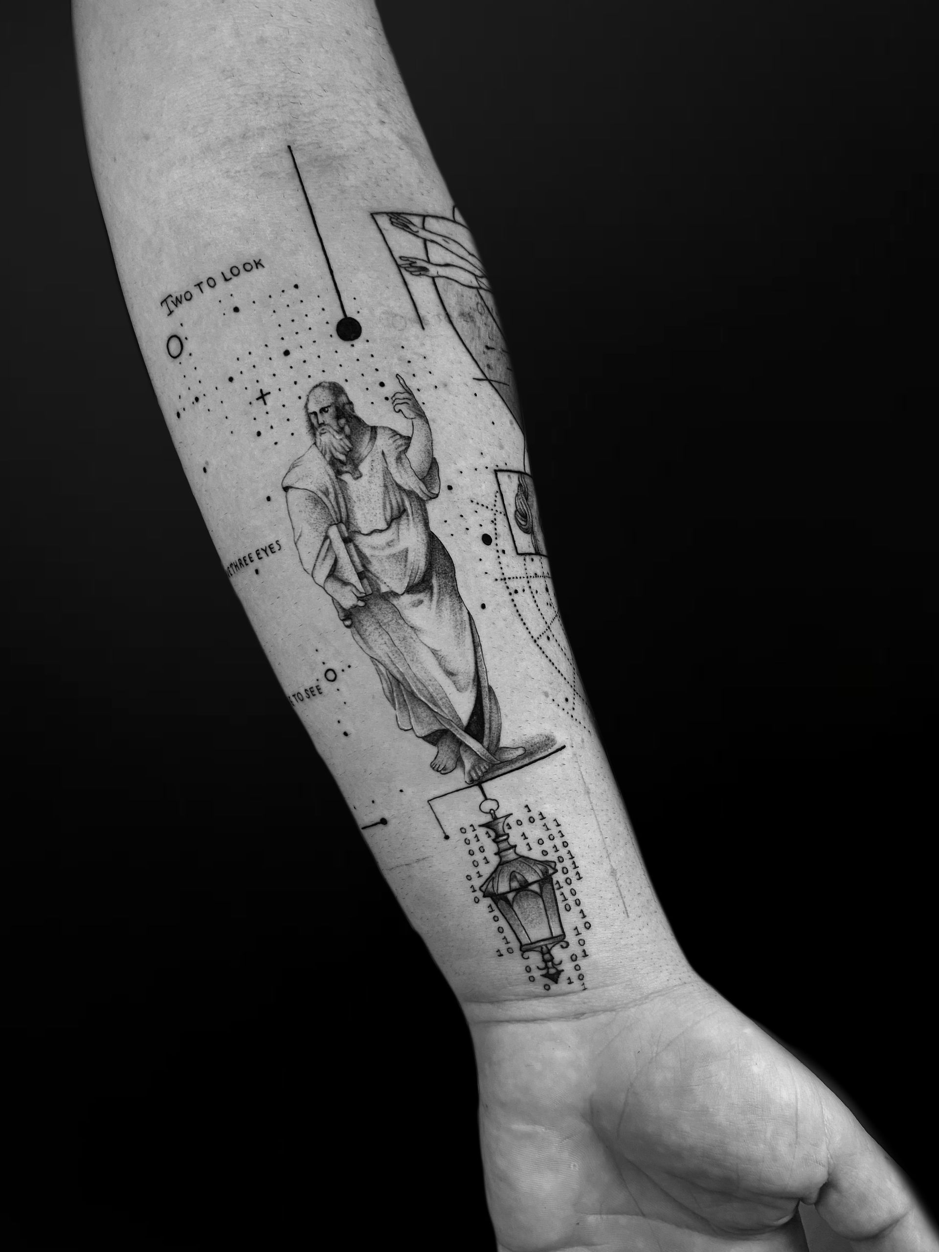 A forearm tattoo featuring a classical figure drawing combined with technical lines, dots, and a lantern icon.
