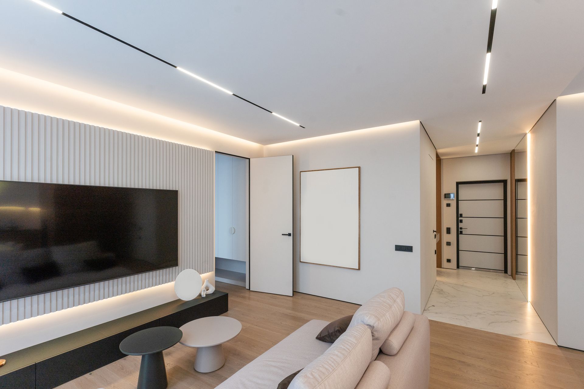 Living room interior with LED lighting in modern house.