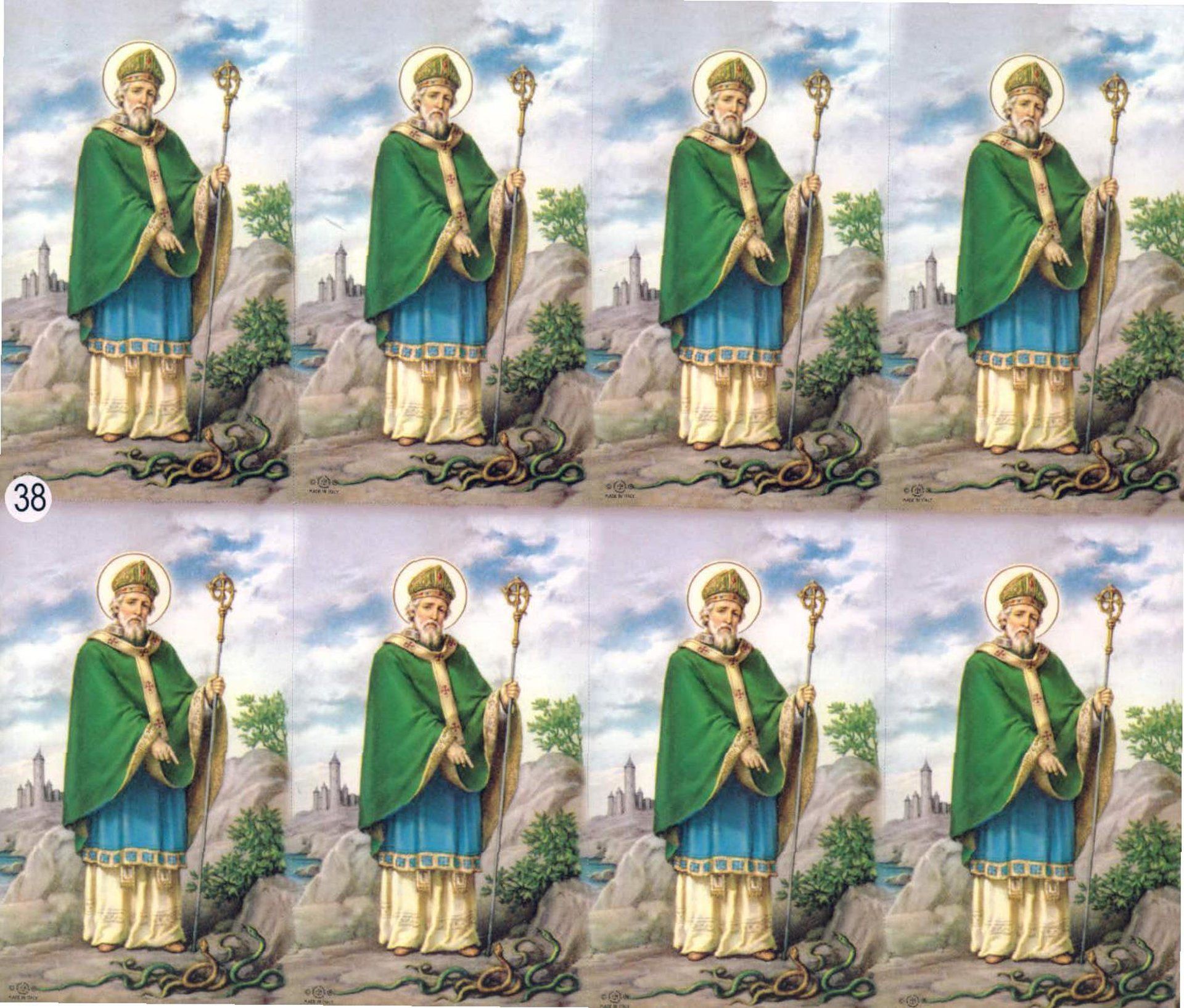 Saint Patrick in green robes with staff, standing on a hill.