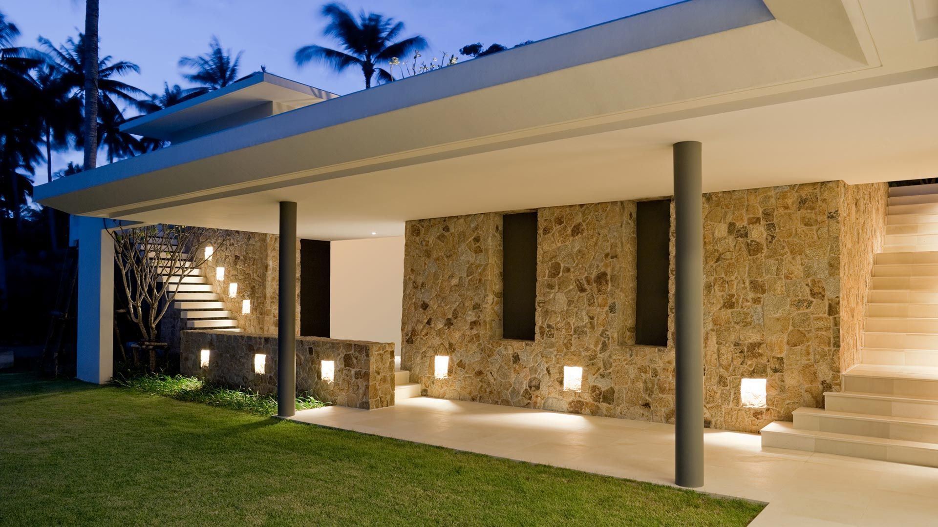 Modern House with a Stone Wall – Moline, IL – QCFI Concrete & Masonry Modern House with a Stone Wall – Moline, IL – QCFI Concrete & Masonry