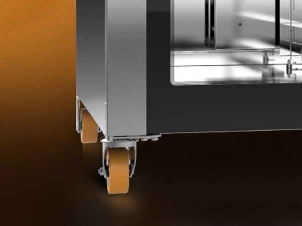 A close up of a machine with wheels on it