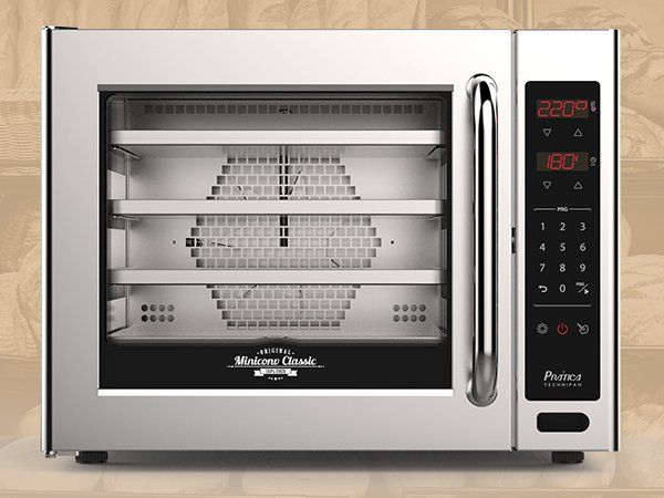 A stainless steel oven with a digital display that reads 3:00
