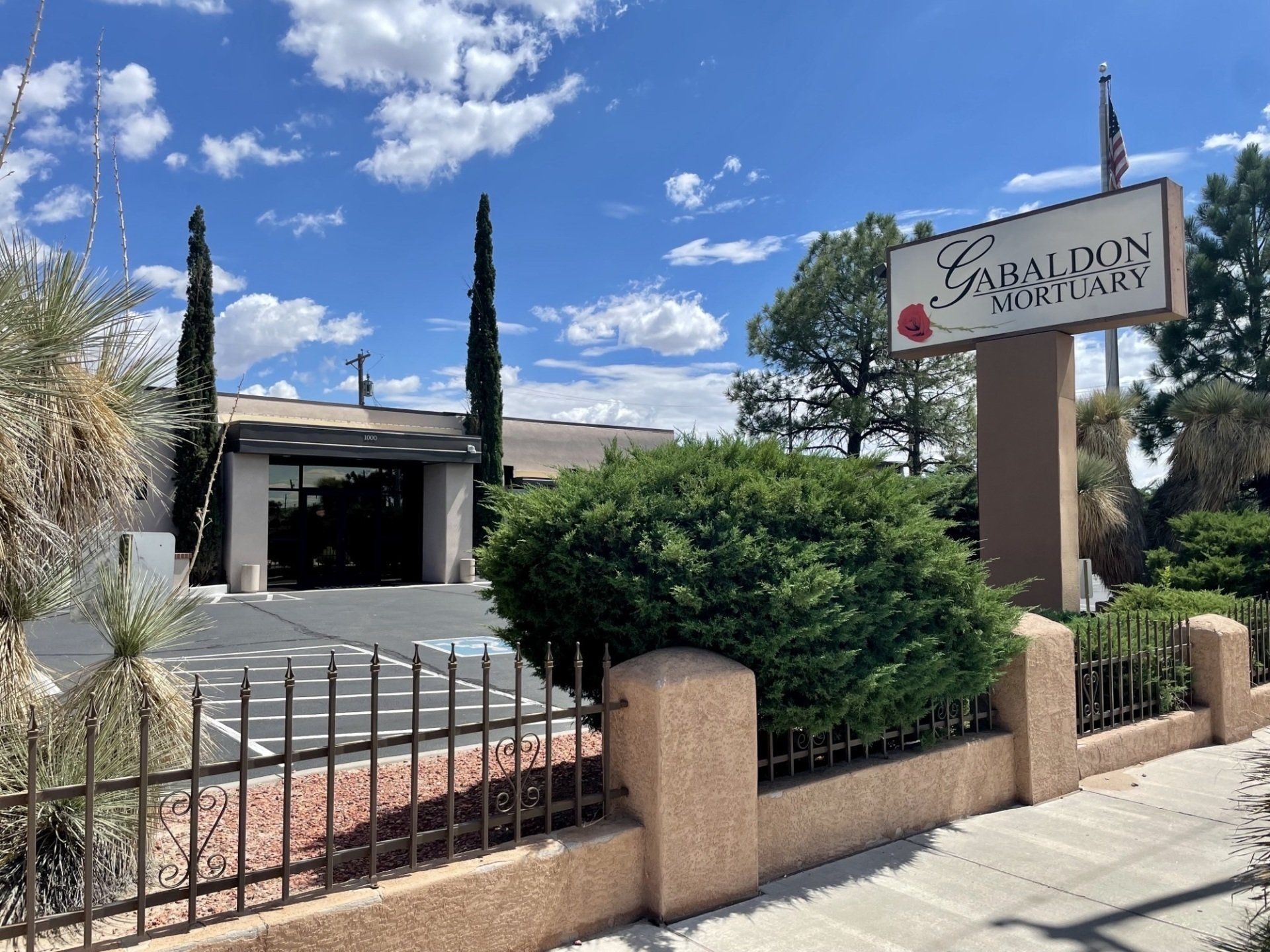 A mortuary building with a sign that reads