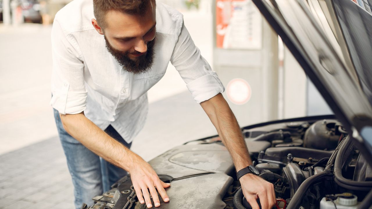 Manual car engine check for potential issues and repairs