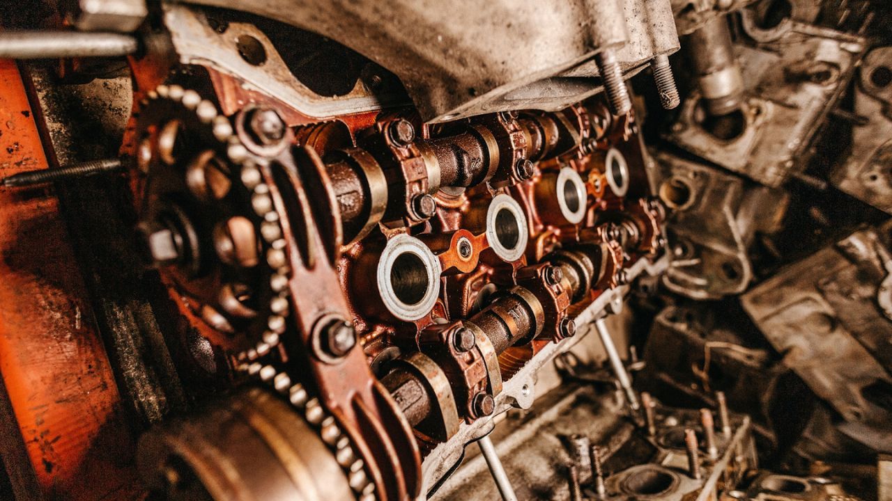 Close-up of internal engine components with camshaft and gears