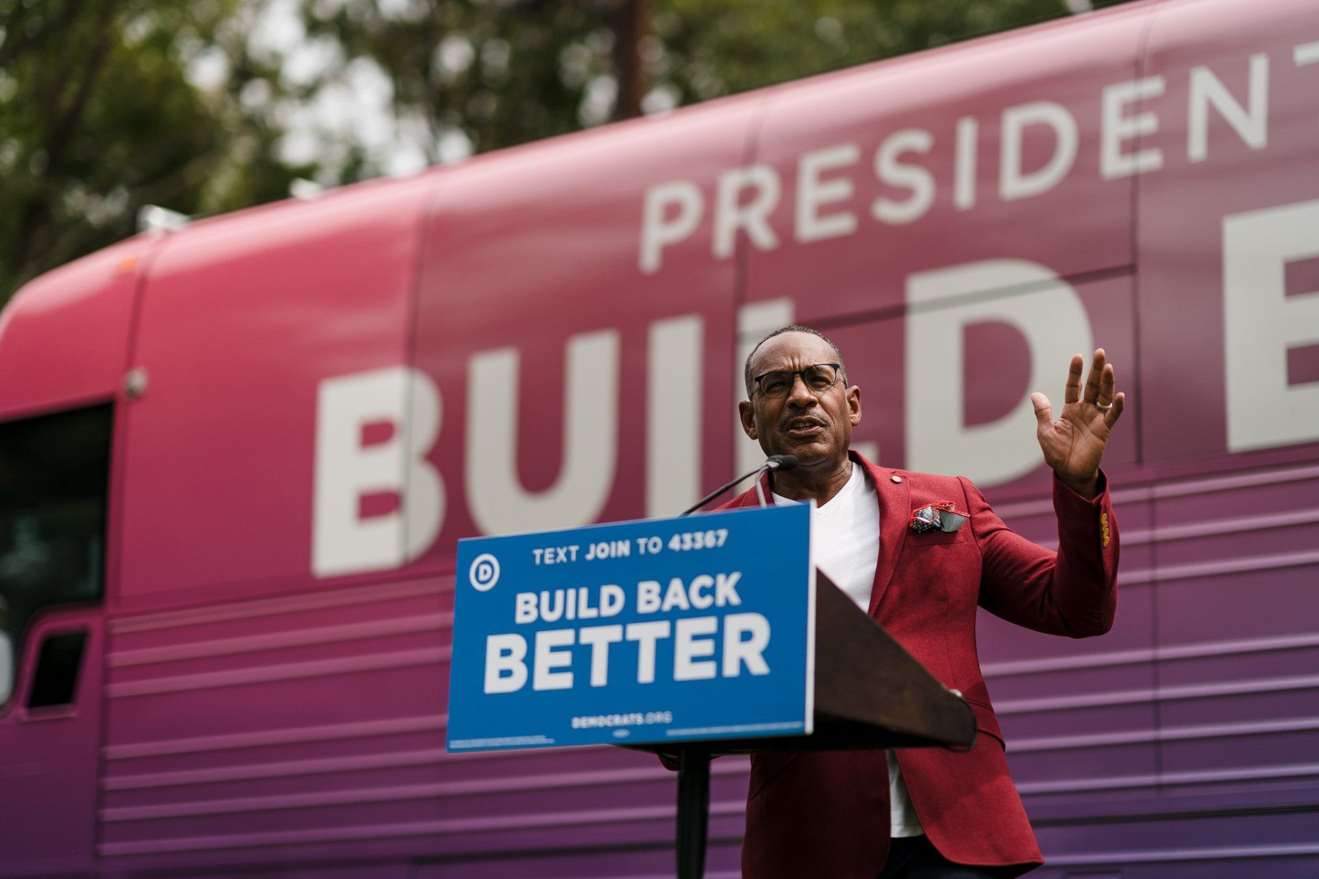 man speaking at podium