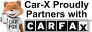 Car-X fox holding a phone with a Carfax report. Car-X partners with Carfax.