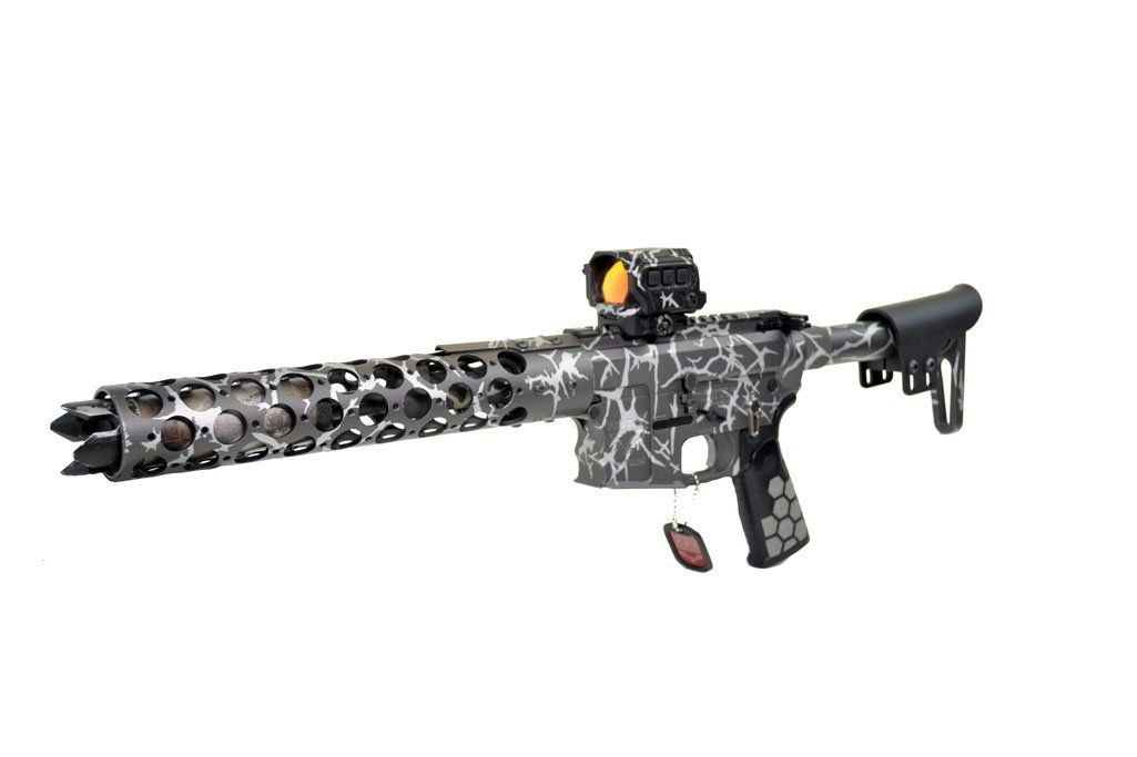 Custom rifle with camouflage pattern and red dot sight.